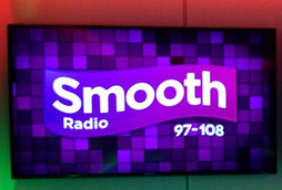 Image of Smooth Radio logo on the tv